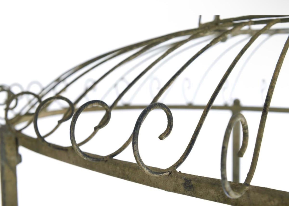 Carretto porta piante Giardino Segreto in metallo verde anticato con design elegante e romantico.